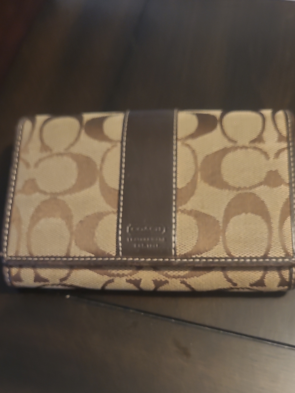 Coach Hampton signature wallet in khaki with brown leather trim.